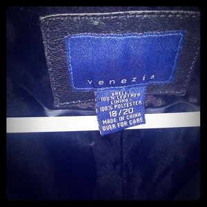 Used black leather coat